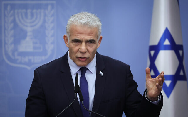Opposition Leader and head of the Yesh Atid party Yair Lapid speaks during a faction meeting at the Knesset in Jerusalem, on November 20, 2023 (Yonatan Sindel/Flash90)