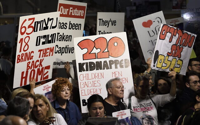 Israelis, including the families of Gaza hostages, attend the ‘50 Days of Hell’ rally in support of the hostages held by Hamas, outside the 'Hostages Square' near the Tel Aviv Museum of Art, November 25, 2023, in Tel Aviv. (Gili Yaari/FLASH90)