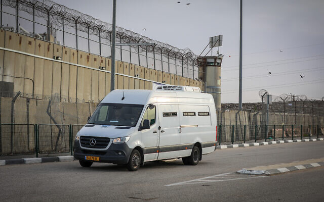 Vehicles with Palestinian terror convicts who will be released as part of a deal between Israel and Hamas arrive at the Ofer prison, November 25, 2023. (Jamal Awad/Flash90)