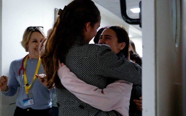 Sahar Calderon, right, hugs her mother after being released from Hamas captivity on November 27, 2023. (Israel Defense Forces)