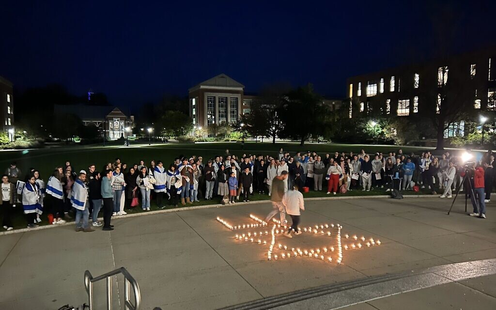 Students at the University of Connecticut hold a candle-lit vigil for victims of the October 7 Hamas atrocities on campus in Storrs, Connecticut, October 8, 2023. (Courtesy)