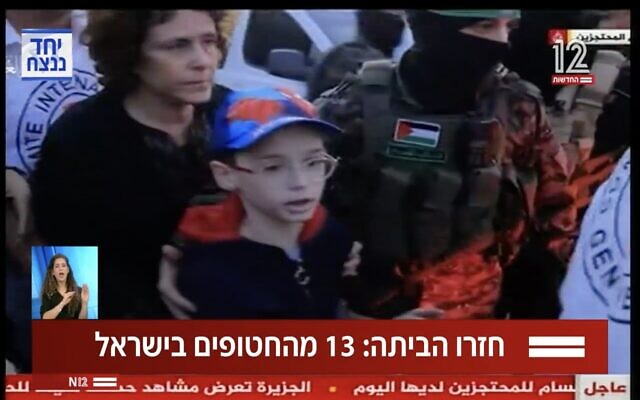 Hamas terrorists transfer Ohad Munder to the Red Cross in Khan Younis on November 24, 2023. (Screen capture/X)
