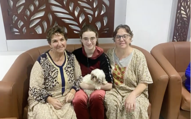Mia Leimberg, 17, center, with her mom, Gabriela Leimberg, right, and her aunt Clara Marman, left, are seen after being released as hostages by Hamas on November 28, 2023. (Screenshot/Courtesy)