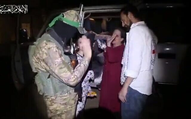 A Hamas propaganda video of the terror group releasing hostages in Gaza, late November 25, 2023. (Screen capture/X)