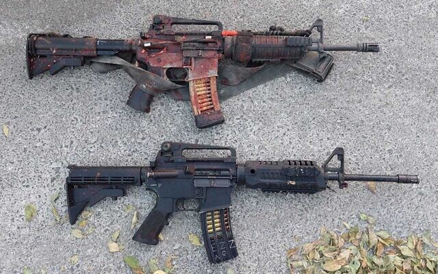 Two assault rifles seized by Israeli police from Palestinian gunmen who were killed during an operation in the West Bank city of Tulkarem, November 6, 2023. (Israel Police)