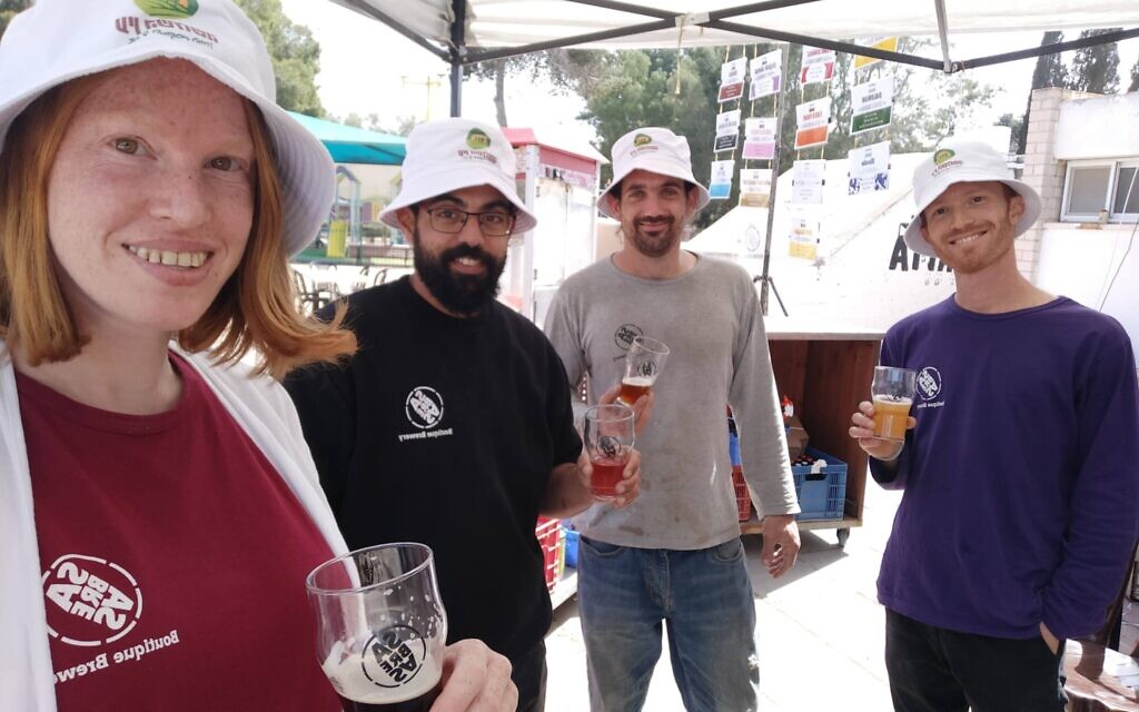 Meital Leffler, (left) is one of a crew of four volunteers who make wine and beer at Kibbutz Ein Hashlosha, who were all evacuated to Eilat after the Hamas attacks of October 7, 2023 (Courtesy)