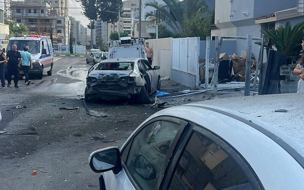 Cars damaged in a rocket attack on Ashkelon on November 14, 2023 (Ashkelon municipality)