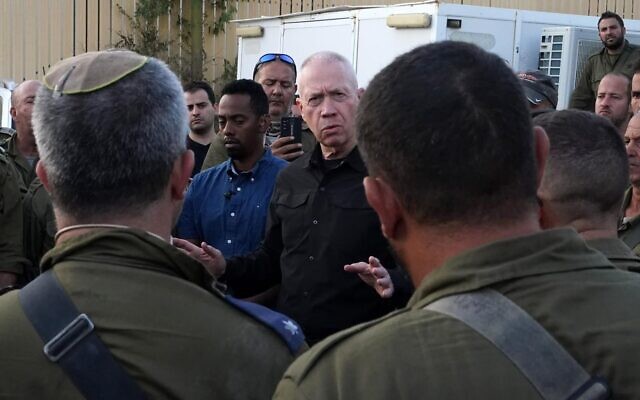Defense Minister Yoav Gallant speaks to reservist troops in southern Israel, November 15, 2023. (Ariel Hermoni/ Defense Ministry)
