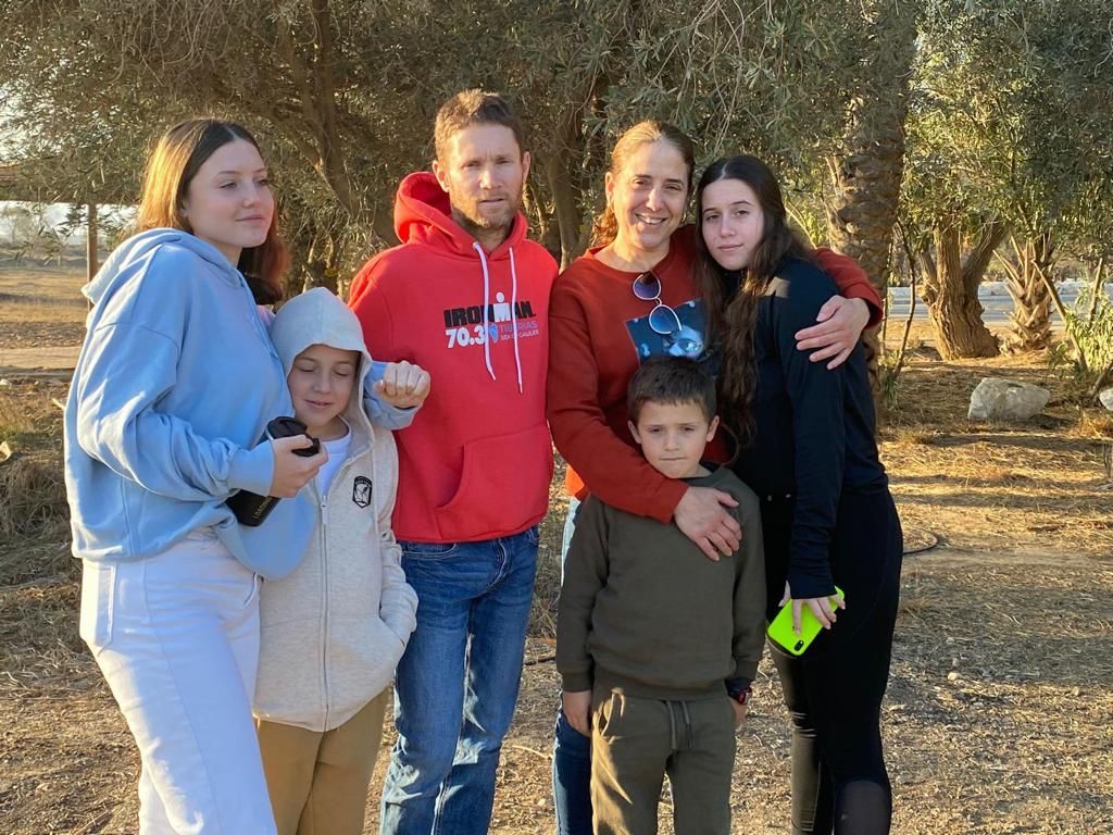 The Goldstein-Almog family from Kfar Aza; father Nadav (third from left) and eldest daughter Yam (far right), were killed by Hamas terrorists on October 7, 2023. The rest of the family was taken hostage to Gaza (Courtesy)