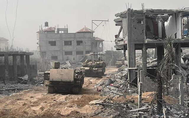 Israeli armored vehicles operate inside the Gaza Strip, November 1, 2023. (Israel Defense Forces)