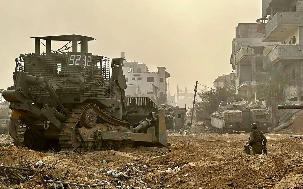 An Israeli armored vehicle operates inside the Gaza Strip, November 2, 2023. (Israel Defense Forces)
