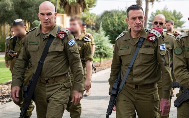 IDF Chief of Staff Lt. Gen. Herzi Halevi (right) walks with Northern Command chief Maj. Gen. Ori Gordin, at the Northern Command in Safed, November 13, 2023. (Israel Defense Forces)
