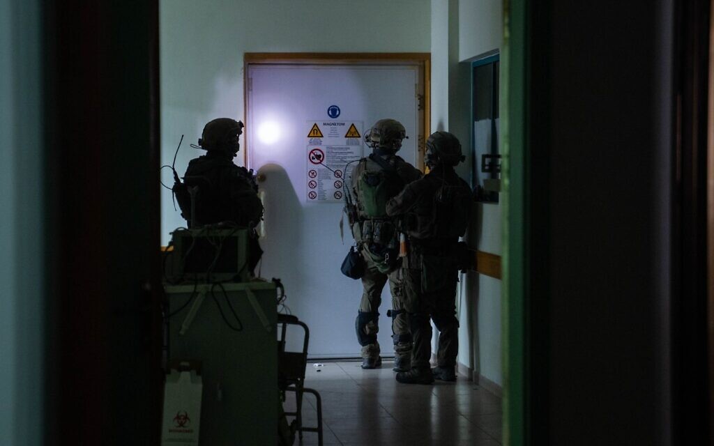 IDF soldiers operate at Shifa Hospital in Gaza City in a handout photo distributed on November 15, 2023. (Israel Defense Forces)