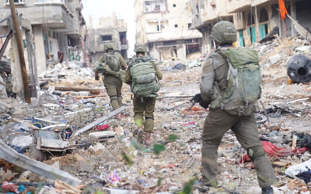 IDF soldiers in the Gaza Strip in a handout photo distributed on November 18, 2023. (Israel Defense Forces)