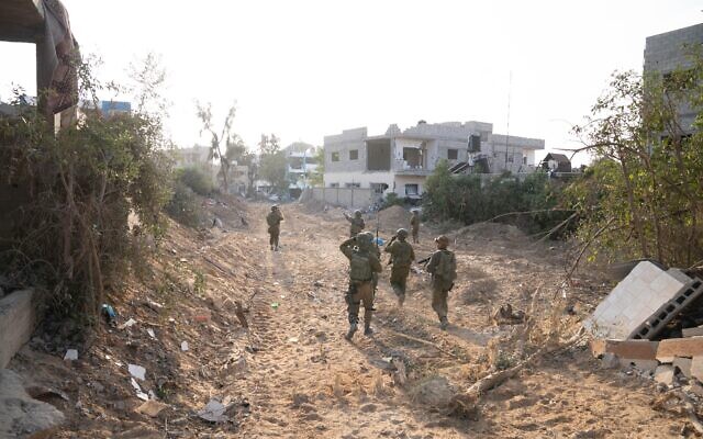IDF soldiers operating in the northern Gaza Strip in a handout photo released for publication on November 22, 2023. (IDF)