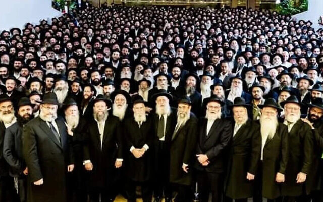 Approximately 1,400 Chabad rabbis who live in Israel pose for a group photo in Jerusalem on November 12, 2023. (Courtesy of Tzvaim Productions/Mendi Kotler/Mendi Kurant)