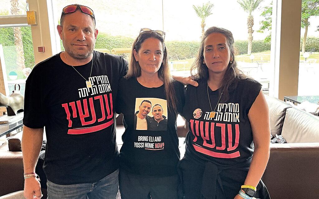 Yoav Engel (left), Nira Sharabi and Sharon Engel at the David Spa hotel at the Dead Sea on November 15, 2023, after Sharabi's husband, Yossi Sharabi and the Engel's son, Ofir, were taken captive by Hamas terrorists on October 7, 2023 (Jessica Steinberg/Times of Israel)