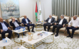 Hamas leader Ismail Haniyeh (third right), and top official Khalem Mashaal (second right), are seen meeting with Fatah's Nasser al-Qudwa (second left) and Samir al-Mashrawi (third left) in Qatar on November 22, 2023. (Courtesy)