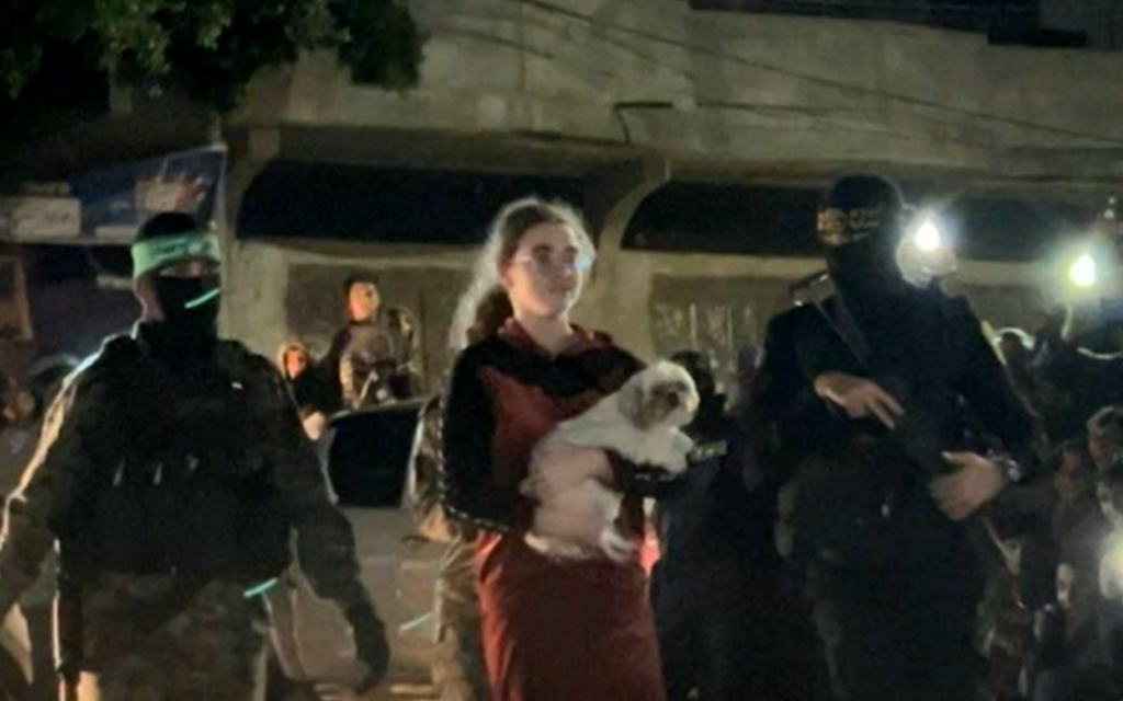 Mia Leimberg, 17, seen in footage from inside the Gaza Strip with her dog, as she is transferred to the Red Cross as part of a hostage deal between Israel and Hamas, November 28, 2023. (Screenshot)