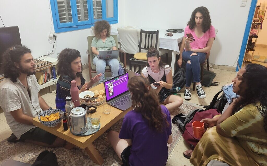 Narjis Shafoot, right, and activists from the Rov Hair Jewish-Arab movement meet to discuss cleaning shelters in Haifa, Israel on November 6,  2023. (Canaan Lidor/Times of Israel)