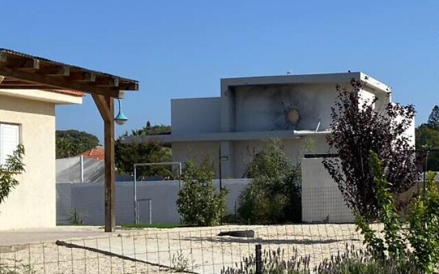 A home hit by an anti-tank rocket at Moshav Netiv HaAsara, pictured November 21, 2023. (David Horovitz / Times of Israel)
