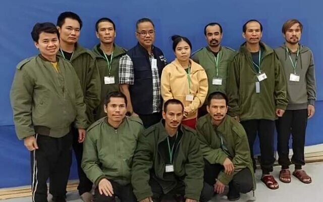The Thai citizens released from Hamas captivity are seen with Thai officials in Israel on November 25, 2023. (Courtesy)