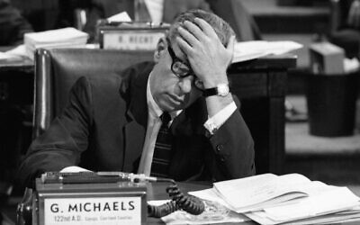 New York State Assemblyman George Michaels (D-Auburn) holds his head after changing his vote to 'yes' on a 1970 bill that gave New York the most liberal abortion law in the country, April 9, 1970. (Bettmann Archive/Getty Images via JTA)