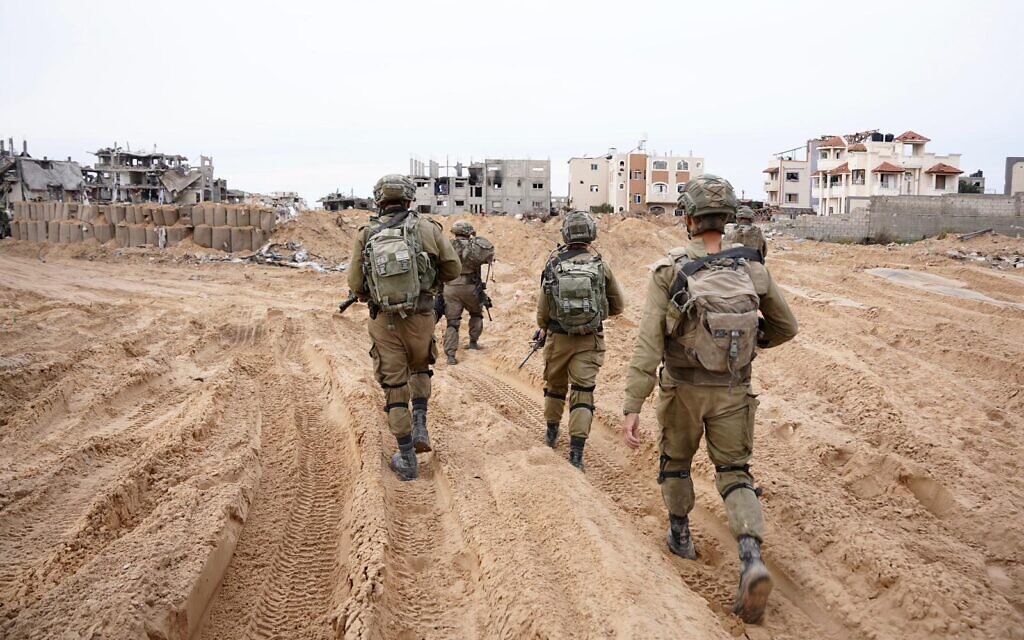 Israeli troops in the Gaza Strip in an undated photograph released December 11, 2023 (Israel Defense Forces)