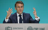 France's President Emmanuel Macron speaks during a press conference at the COP28 United Nations climate summit in Dubai on December 2, 2023. (Photo by Ludovic MARIN / AFP)