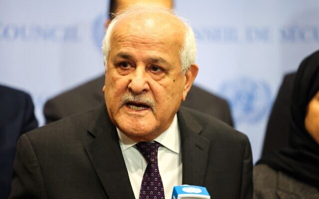 Palestinian Authority Ambassador to the United Nations Riyad Mansour, flanked by representatives of Arab countries, speaks to the press after a UN Security Council meeting on a resolution calling for a ceasefire in Gaza, at UN headquarters in New York on December 8, 2023. (Charly Triballeau/AFP)