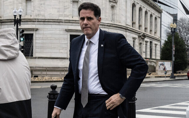 Strategic Affairs Minister Ron Dermer walks into the Executive Office Building next to the White House in Washington, DC on December 26, 2023. (Andrew Caballero-Reynolds/AFP)