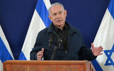 Prime Minister Benjamin Netanyahu delivers remarks to the press in Tel Aviv on December 2, 2023. (Amos Ben Gershom/GPO)