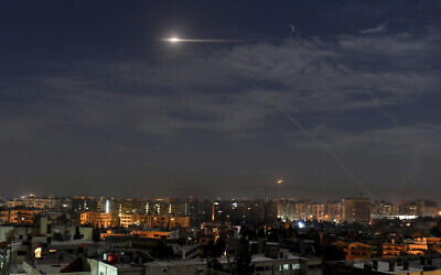 Missiles flying into the sky near international airport, in Damascus, Syria, January 21, 2019. (SANA, the Syrian official news agency, via AP, File)