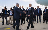 File - US President Joe Biden (right) is greeted by Prime Minister Benjamin Netanyahu after arriving at Ben Gurion International Airport, October 18, 2023. (AP Photo/Evan Vucci)