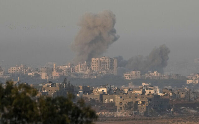 Smoke rises following an Israeli airstrike in the Gaza Strip, as seen from southern Israel, Dec. 3, 2023. (AP Photo/Leo Correa)