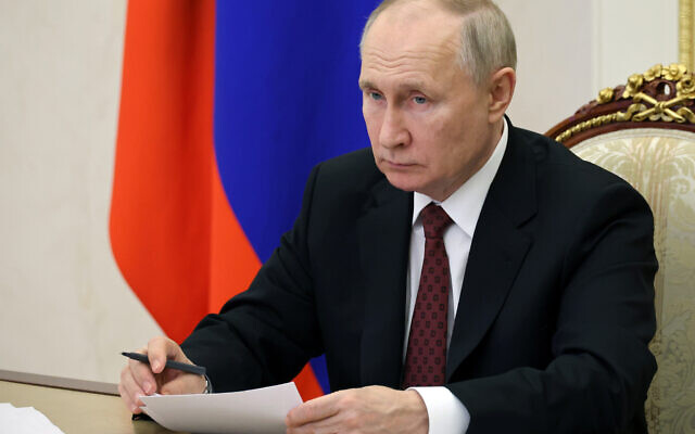 Russian President Vladimir Putin holds the annual meeting of the Presidential Council for Civil Society and Human Rights, via video conference, in Moscow, Russia, December 4, 2023. (Mikhail Klimentyev, Sputnik, Kremlin Pool Photo via AP)