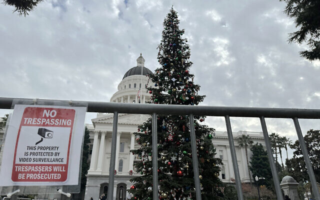 A Christmas tree stands in front of the west steps of the California Capitol on December 6, 2023, in Sacramento, California. (AP Photo/Adam Beam)