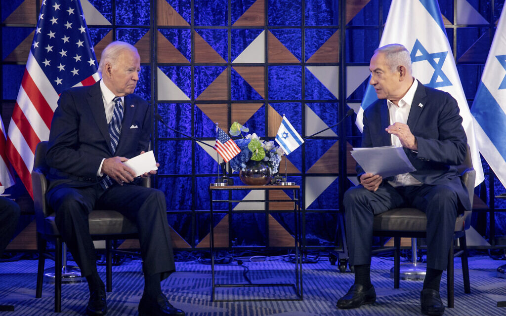 US President Joe Biden, left, meets with Prime Minister Benjamin Netanyahu, right, to discuss the the war between Israel and Hamas, in Tel Aviv, Israel, on October 18, 2023. (Miriam Alster/Pool Photo via AP)