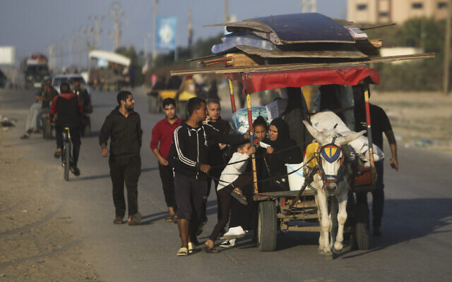 Palestinians flee the Israeli ground offensive in Khan Younis, Gaza Strip, Wednesday, Dec. 6, 2023. (AP Photo/Mohammed Dahman, File)