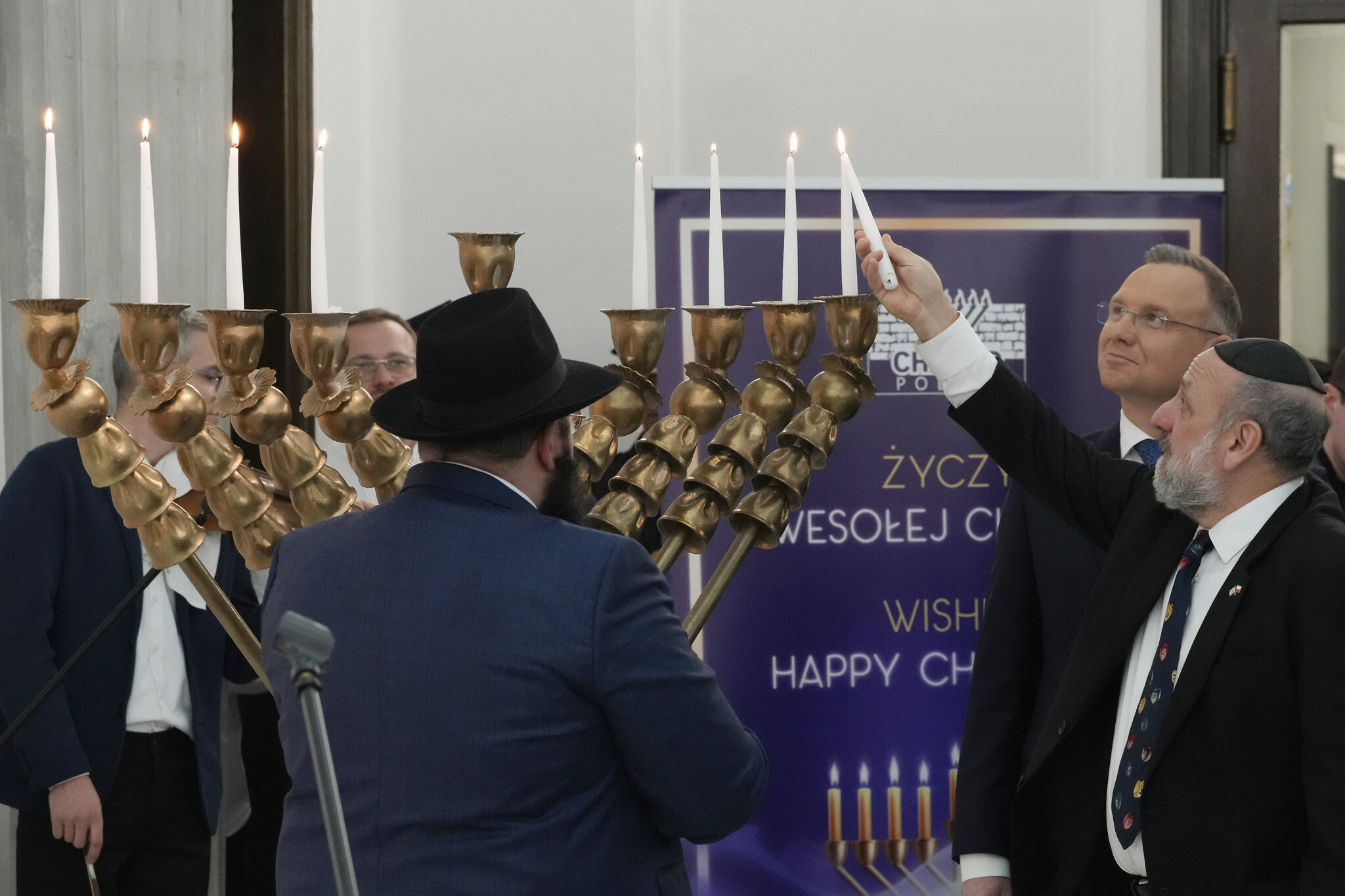 Top Polish leaders celebrate Hanukkah in parliament after antisemitic  incident