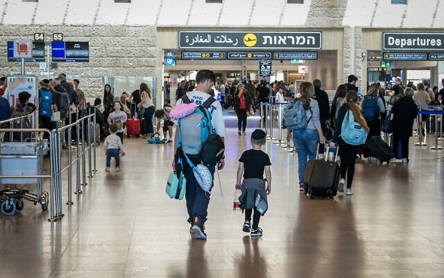 Illustrative: Travelers at the departure hall of Ben Gurion Airport, April 4, 2023. (Avshalom Sassoni/Flash90)