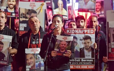 Noam Peri, whose father Chaim Peri, 79, is held hostage in Gaza, speaks as the families of Israelis held hostage by Hamas terrorists in Gaza hold a press conference at "Hostages Square," outside the Tel Aviv Museum of Art, December 16, 2023. (Avshalom Sassoni/Flash90)
