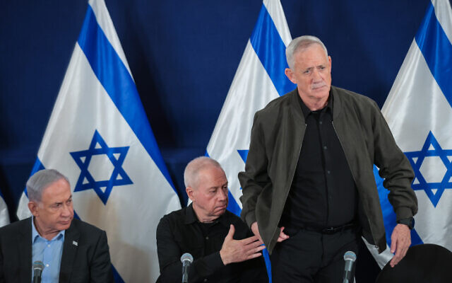 Prime Minister Benjamin Netanyahu, Minister of Defense Yoav Gallant, and Minister Benny Gantz attend a press conference at the Ministry of Defense in Tel Aviv, December 16, 2023. (Noam Revkin Fenton/Flash90)