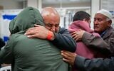 Members of the Ziyadne family embrace upon the release of Bilal and Aiysha at the Soroka Medical Center, December 1, 2023. (Courtesy)