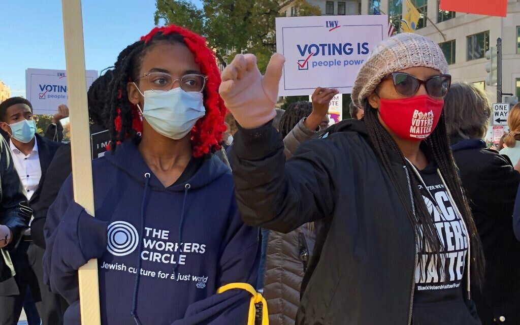Illustrative: Activists from the Workers Circle and Black Voters Matter on their way to a protest outside the White House in 2021. (Workers Circle via JTA)