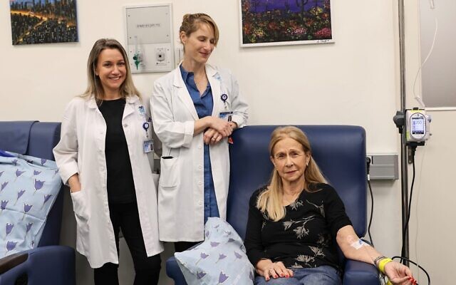 Patient Ophira Barkan with Dr Noa Bergman (center) and Dr Tamara Shiner  at Ichilov Hospital, which becomes the first outside of the US authorized to administer new Alzheimer’s drug Lecanemab in a photo released December 7, 2023 (Jenny Yerushalmi/Ichilov)