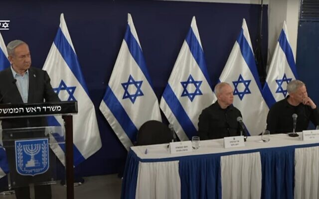 Prime Minister Benjamin Netanyahu (left), Defense Minister Yoav Gallant (center) and Minister Benny Gantz deliver remarks on December 5, 2023. (Screen capture: PMO)