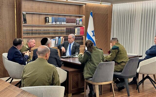 Prime Minister Benjamin Netanyahu meets with advisers in the Kirya military headquarters in Tel Aviv, December 3, 2023. (Courtesy)