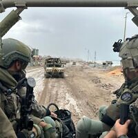 This handout picture released by the Israeli army shows troops on the ground in the northern Gaza Strip on December 2, 2023 (Israel Defense Forces)