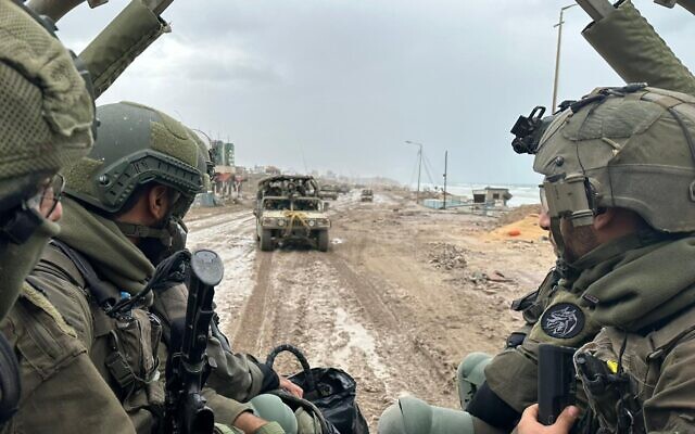 This handout picture released by the Israeli army shows troops on the ground in the northern Gaza Strip on December 2, 2023 (Israel Defense Forces)